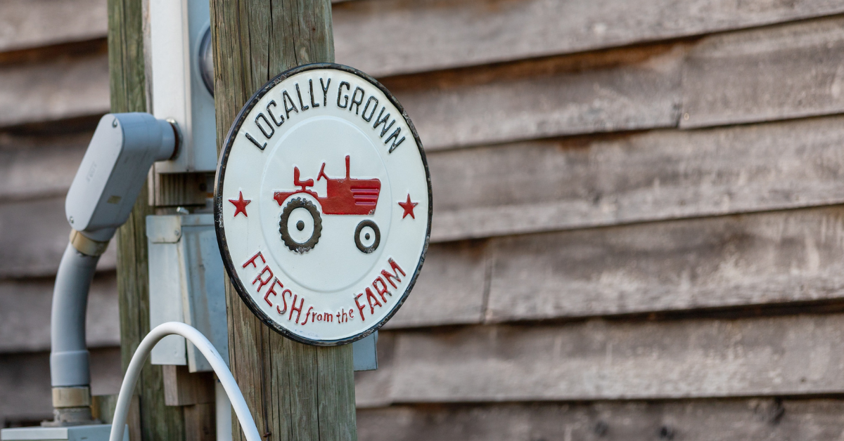 Sign from farm that has locally produced products.